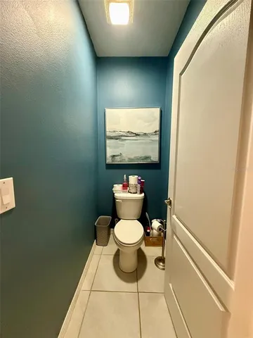 a bathroom with a toilet and a sink