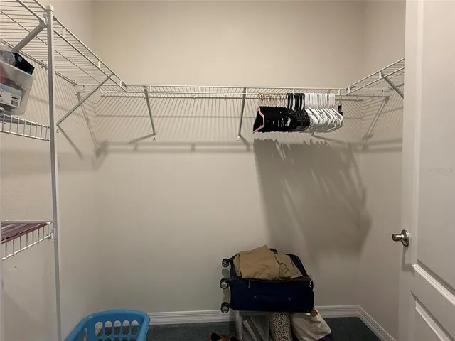 a view of a hallway with workspace