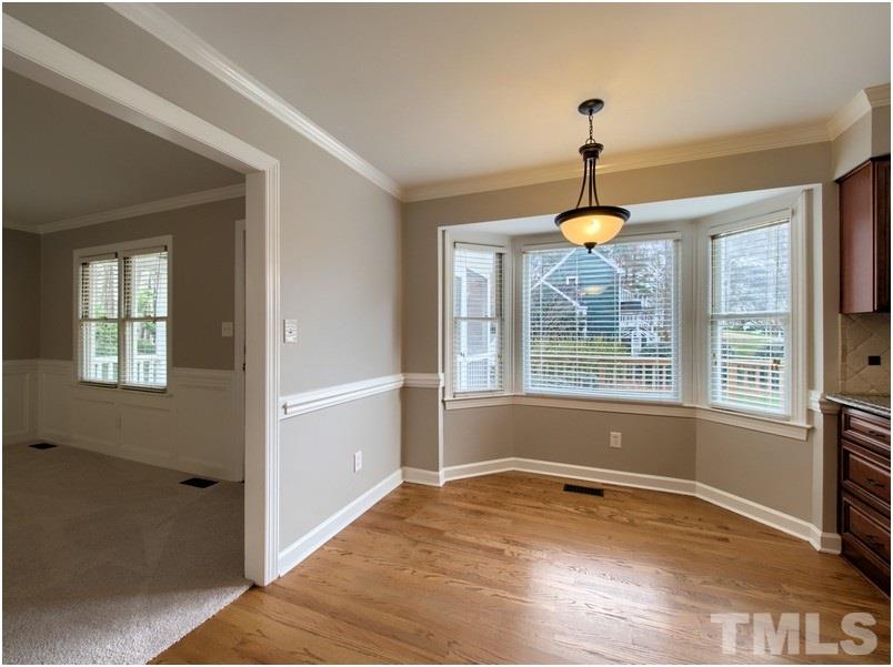 2521 Village Grove Road Raleigh, NC 27613 - Photo 11 of 25 a view of an empty room with a window
