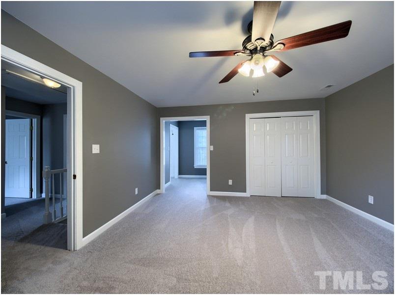 2521 Village Grove Road Raleigh, NC 27613 - Photo 14 of 25 a view of an empty room and window