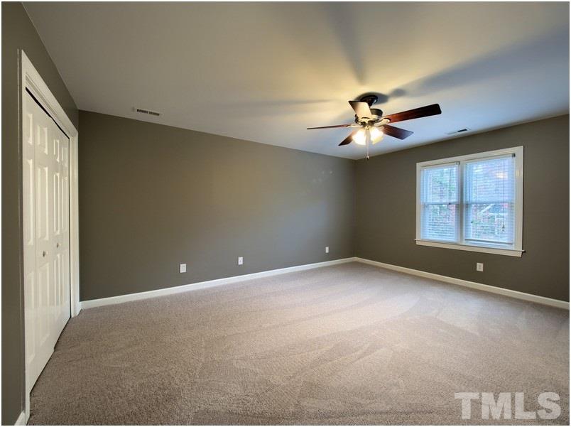2521 Village Grove Road Raleigh, NC 27613 - Photo 15 of 25 a view of an empty room with a window