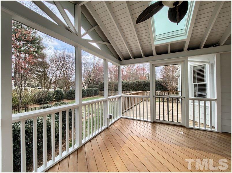 2521 Village Grove Road Raleigh, NC 27613 - Photo 21 of 25 a view of a porch with wooden floor