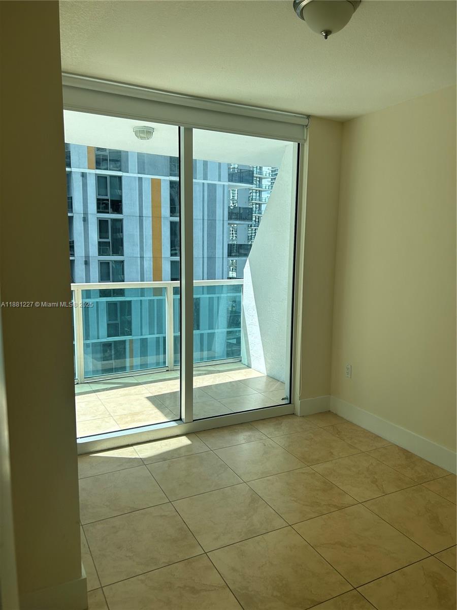 41 Southeast 5th Street, Unit 1108 Miami, FL 33131 - Photo 7 of 8 a view of an empty room