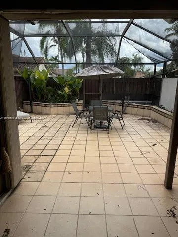 a view of staircase with white walls