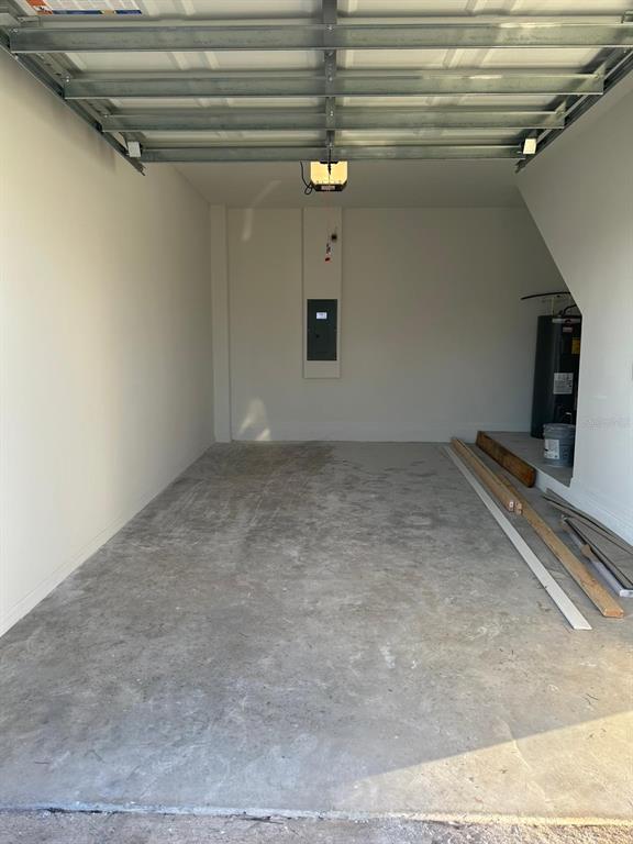 6718 Sherpa Trail, Unit A St. Cloud, FL 34771 - Photo 12 of 13 a view of a livingroom with a staircase