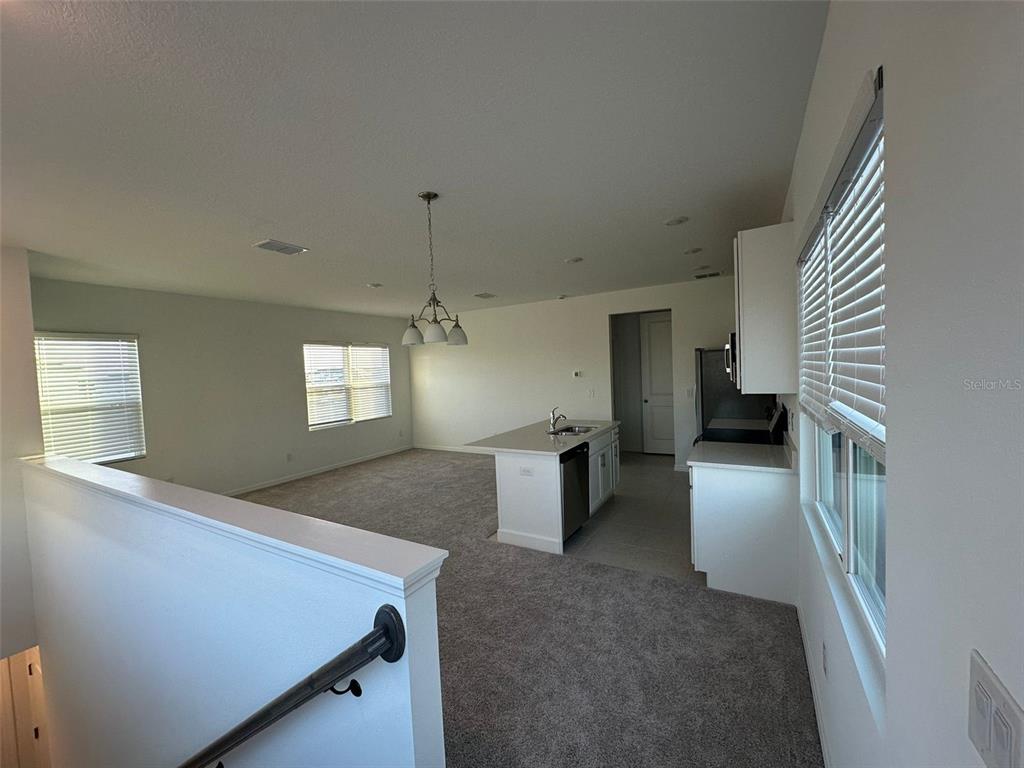 6718 Sherpa Trail, Unit A St. Cloud, FL 34771 - Photo 6 of 13 a view of an empty room with a window