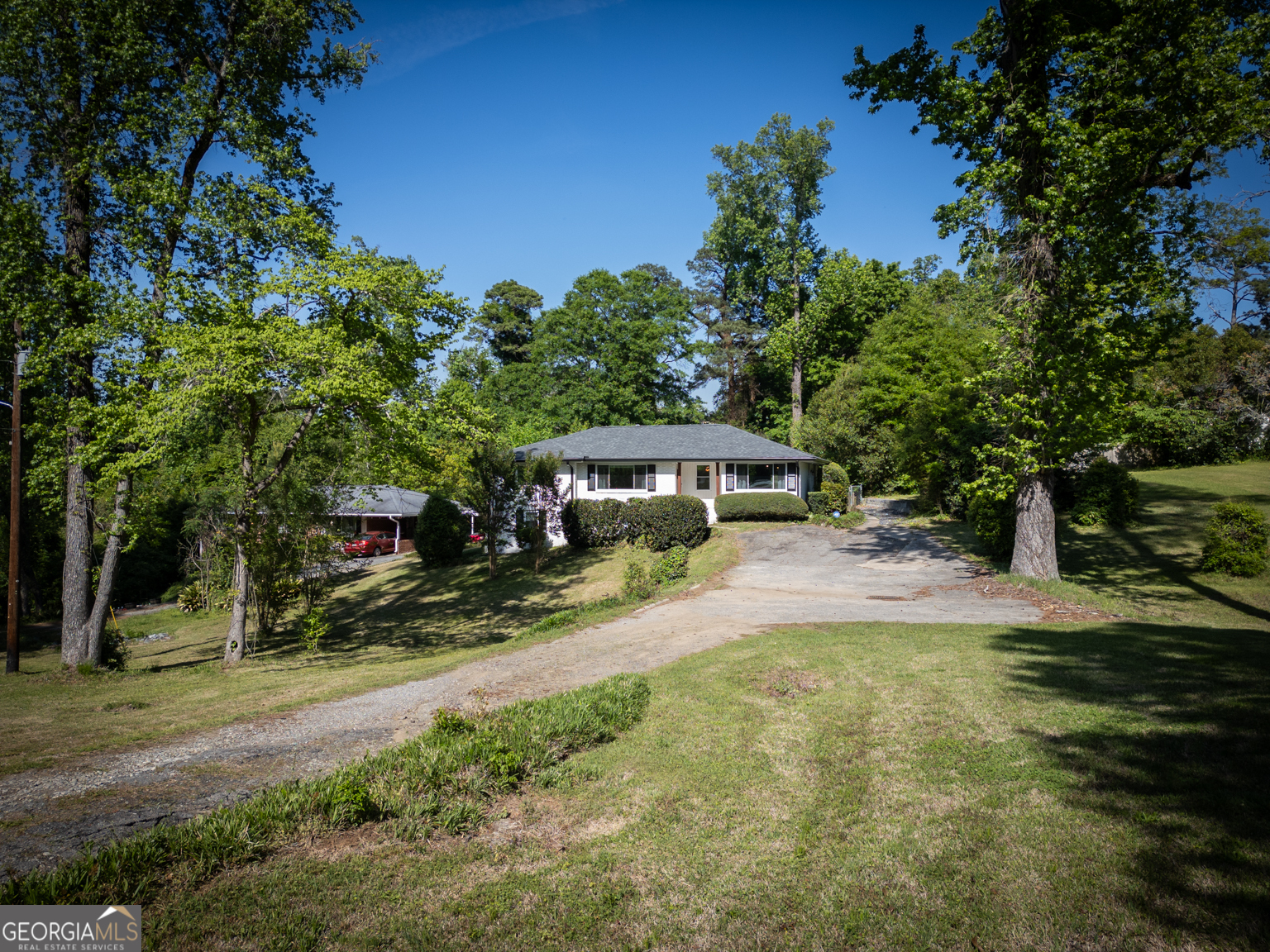 545 Forest Hill Road Macon, GA 31210 - Photo 6 of 63 a view of a house with swimming pool and sitting area