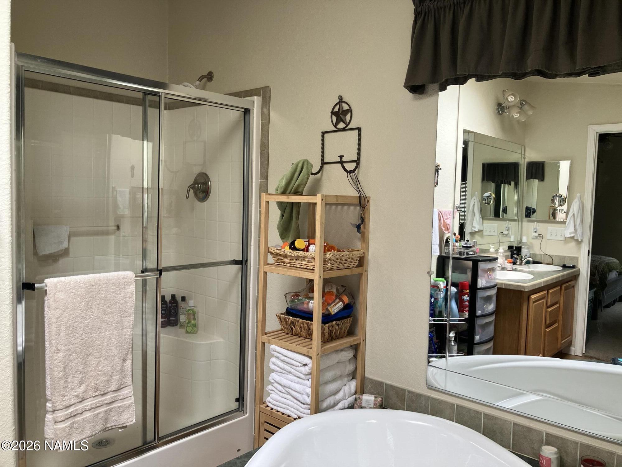 1431 East Cedar Road Williams, AZ 86046 - Photo 33 of 51 a bathroom with a toilet a sink and a shower