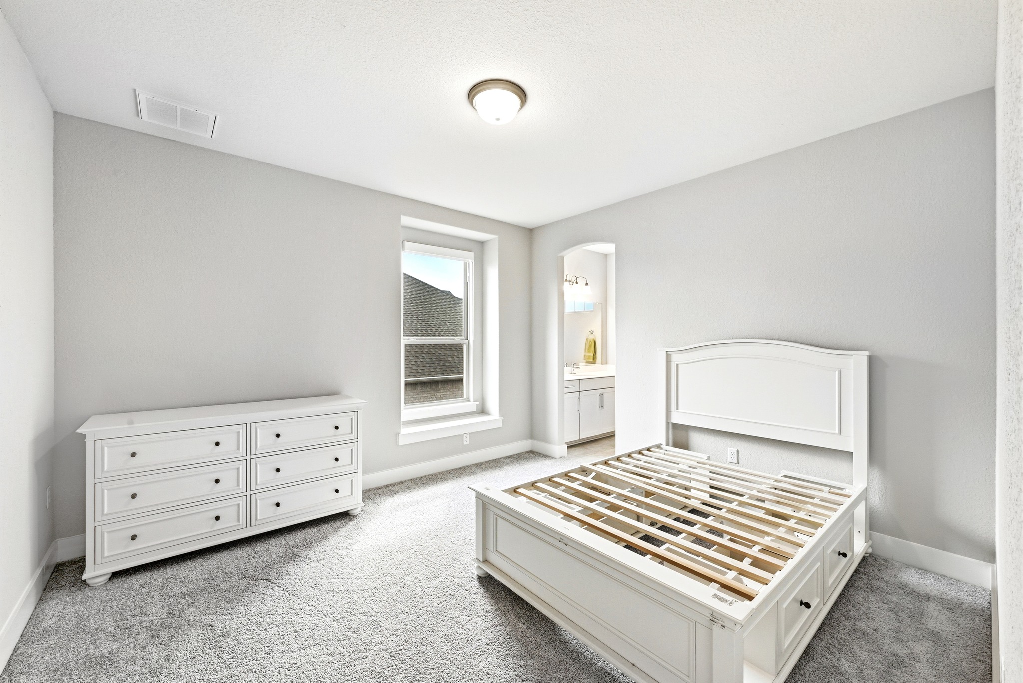 9008 Harper Rae Drive Austin, TX 78717 - Photo 27 of 39 Carpeted room with light-toned walls and a single window