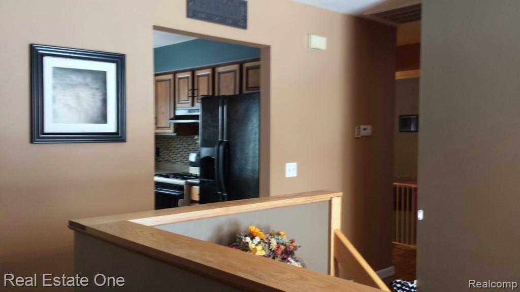 7690 South Eston Road Clarkston, MI 48348 - Photo 3 of 26 Open feel with clean lines and classic, neutral finishes - very inviting and comfortable.