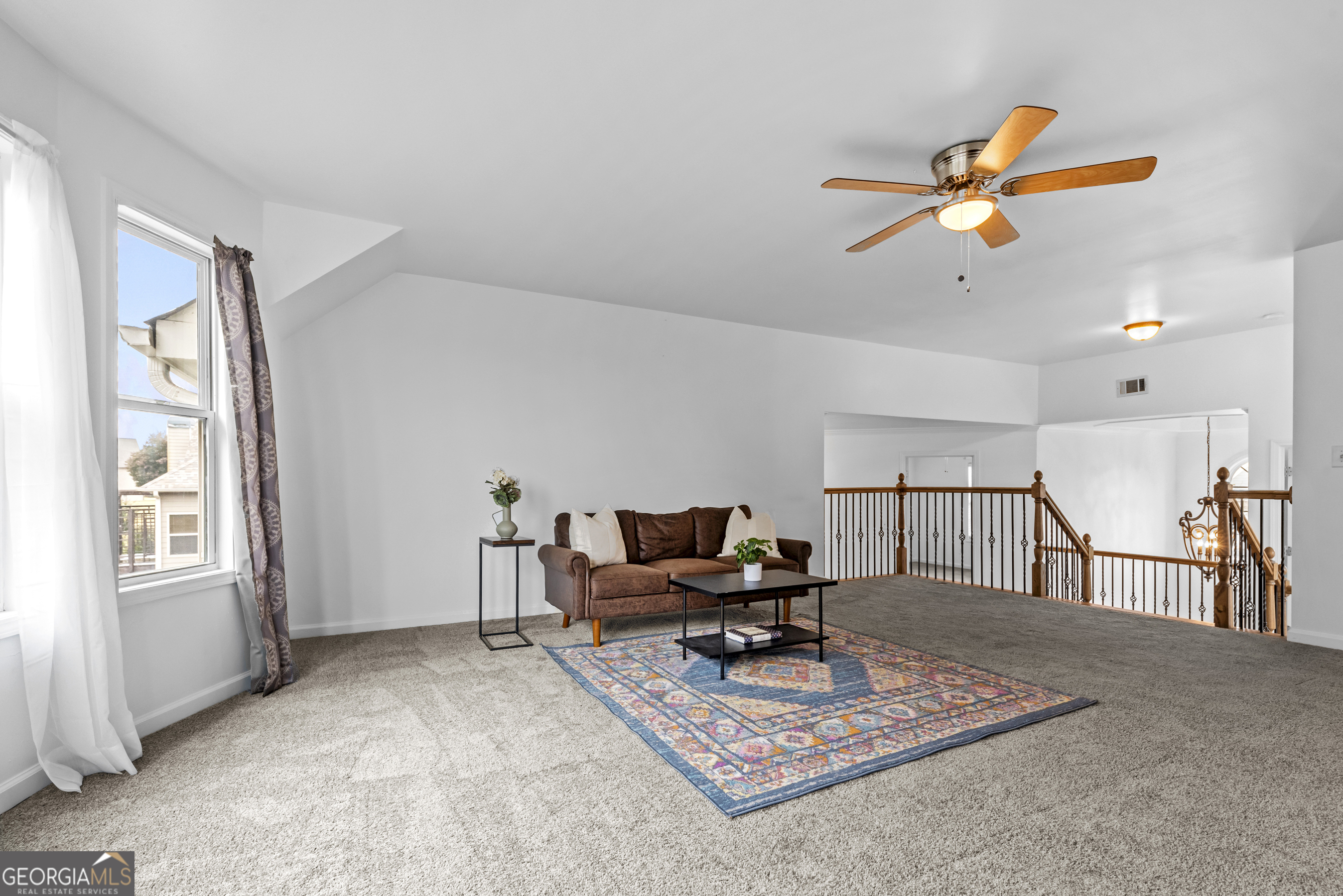 463 Delaperriere Loop Jefferson, GA 30549 - Photo 18 of 75 a living room with furniture and a window