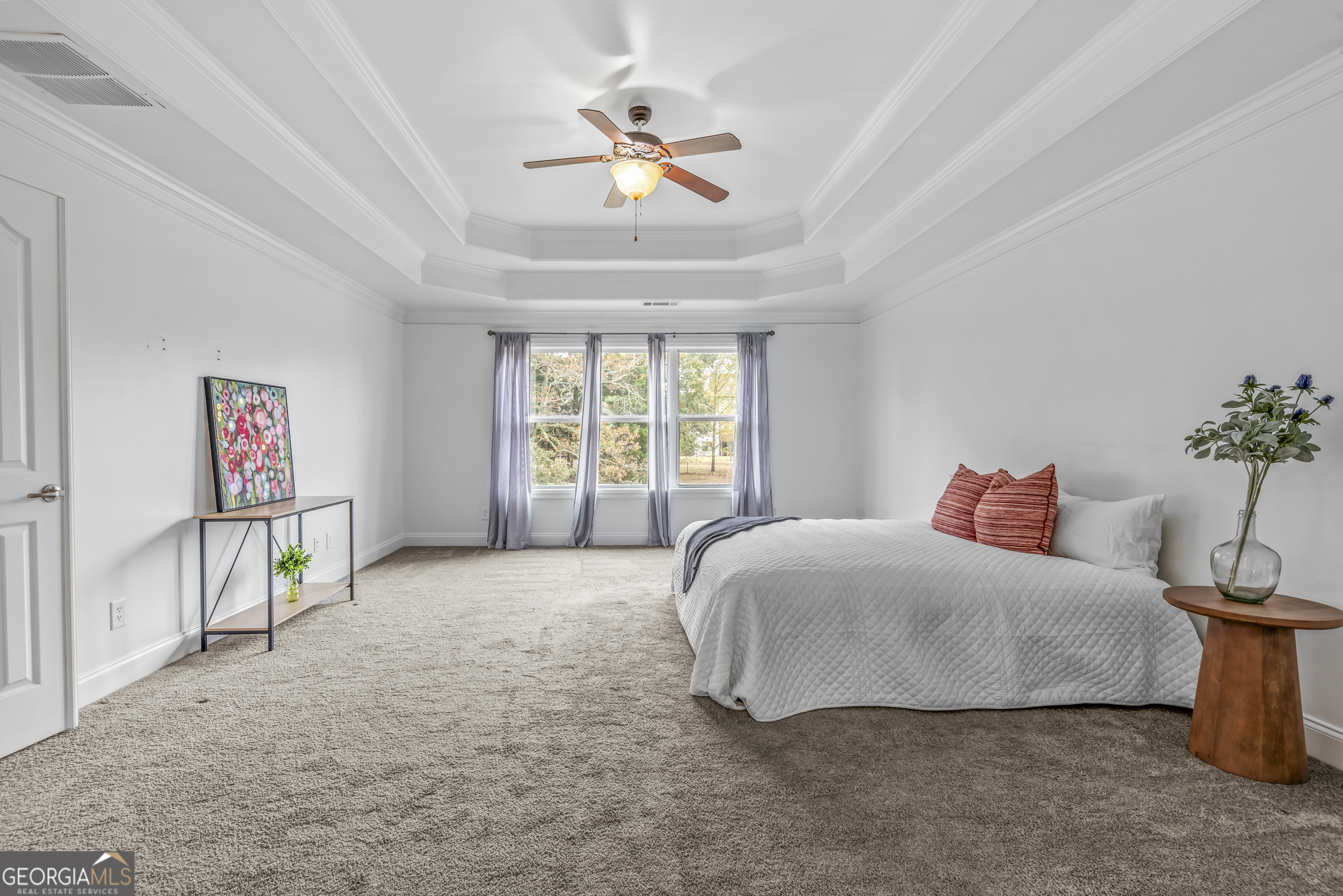 463 Delaperriere Loop Jefferson, GA 30549 - Photo 21 of 75 a bedroom with a bed and a chandelier