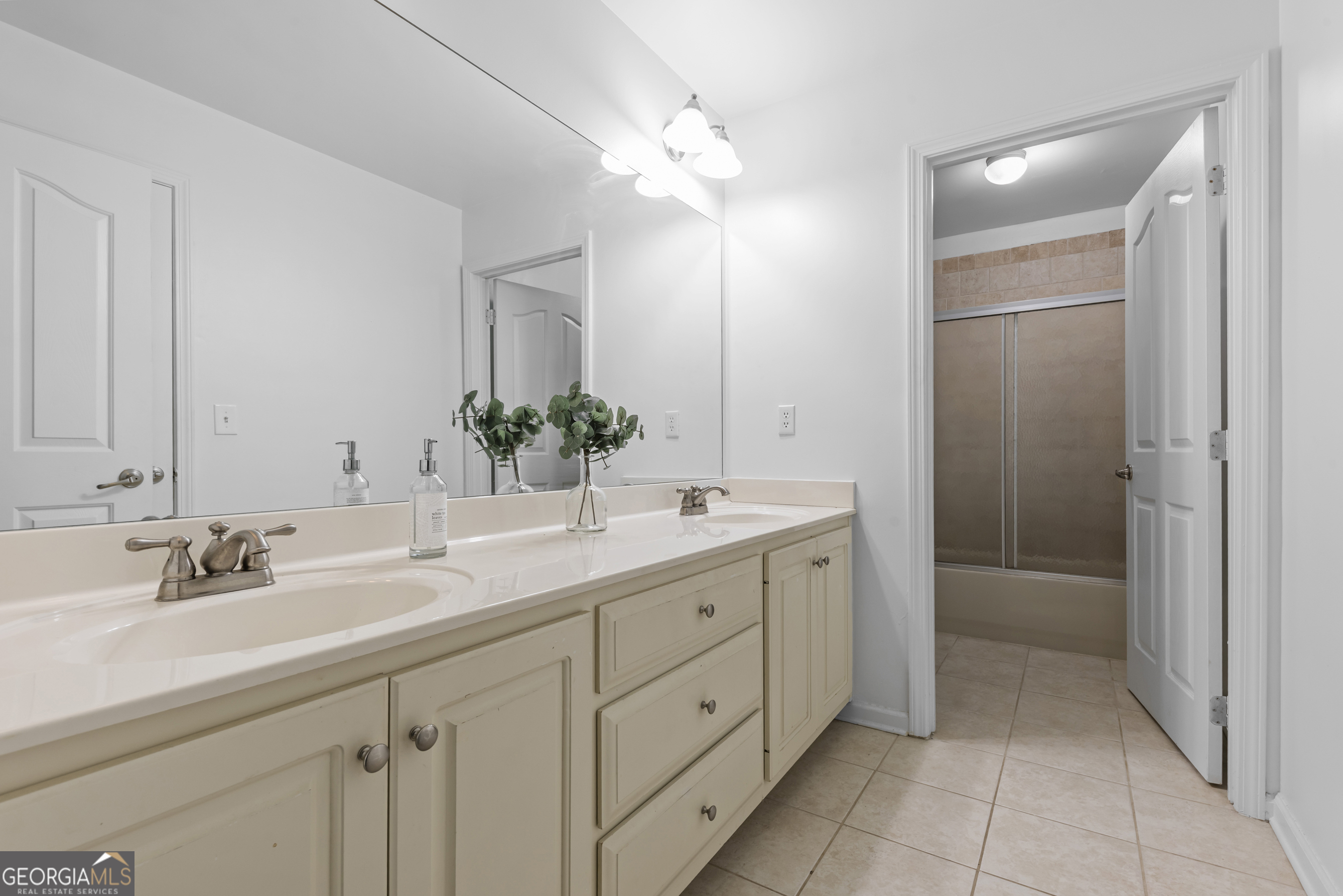 463 Delaperriere Loop Jefferson, GA 30549 - Photo 27 of 75 a bathroom with a double vanity sink mirror and next