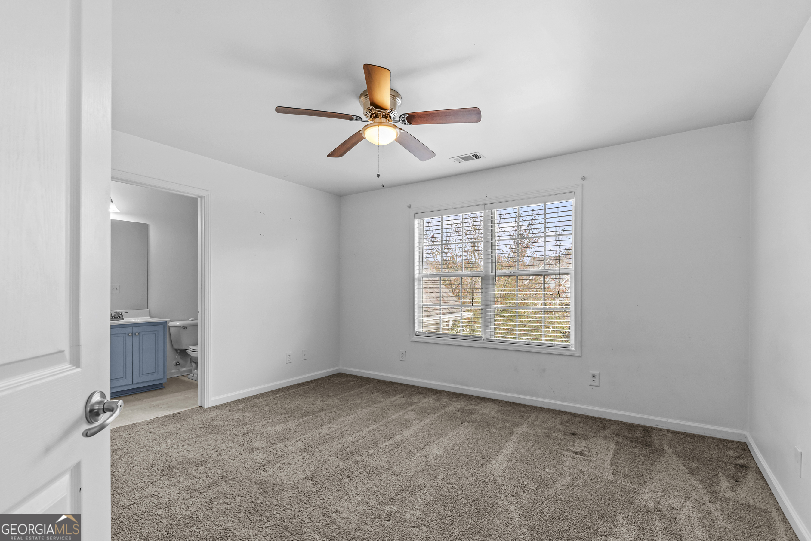 463 Delaperriere Loop Jefferson, GA 30549 - Photo 29 of 75 a view of an empty room with a window