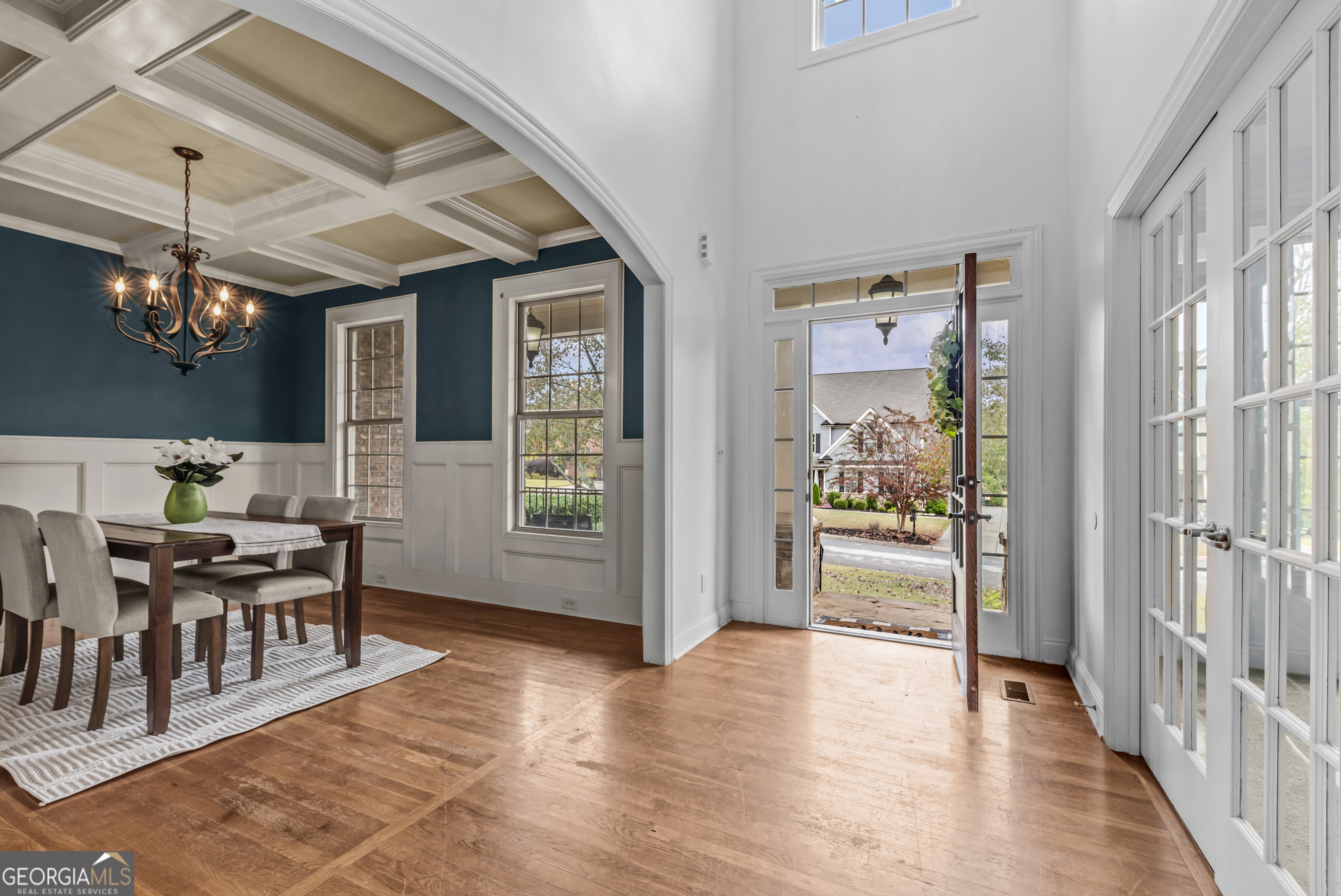 463 Delaperriere Loop Jefferson, GA 30549 - Photo 45 of 75 a view of a dining room with furniture window and wooden floor