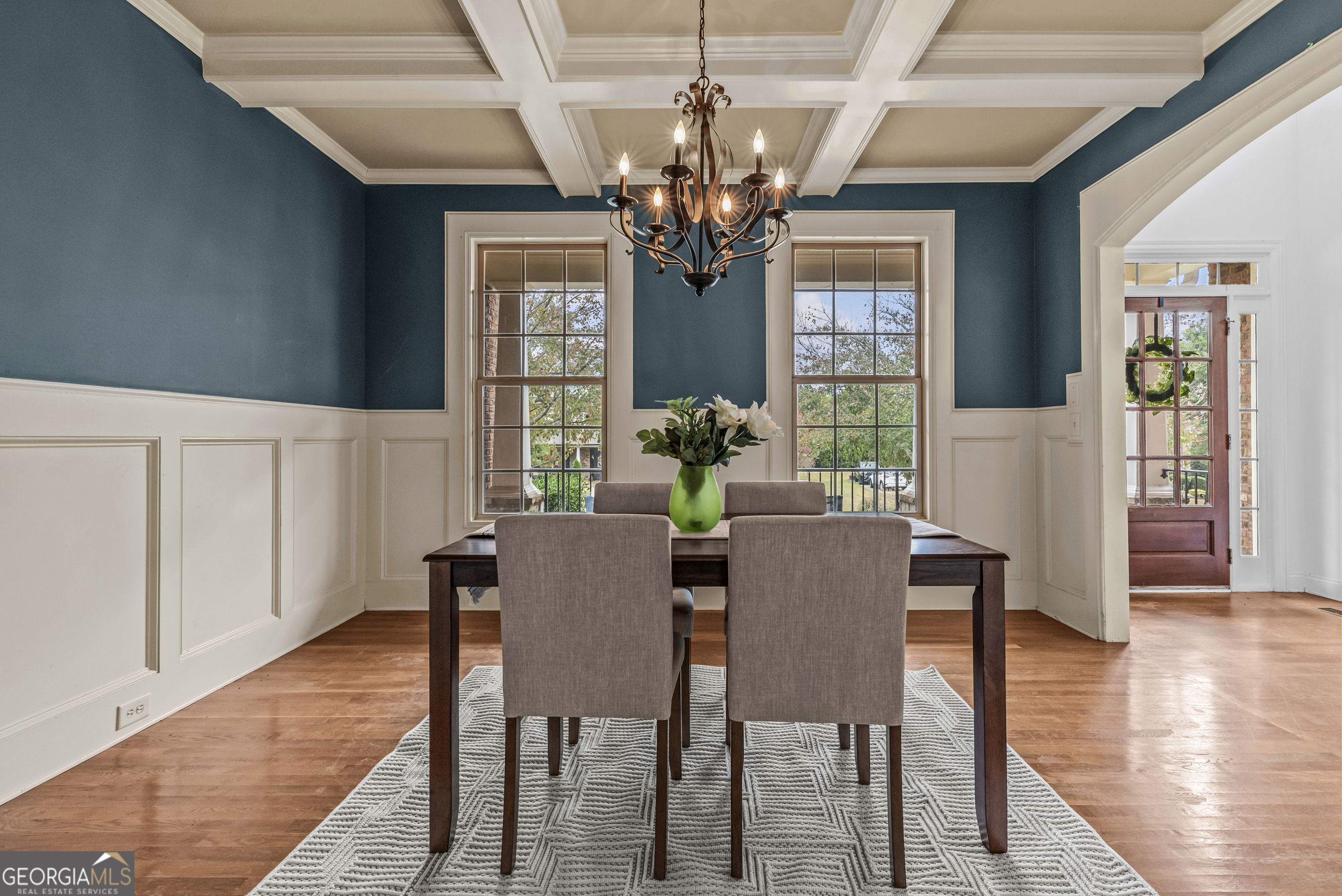 463 Delaperriere Loop Jefferson, GA 30549 - Photo 49 of 75 a view of a dining room with furniture wooden floor and chandelier