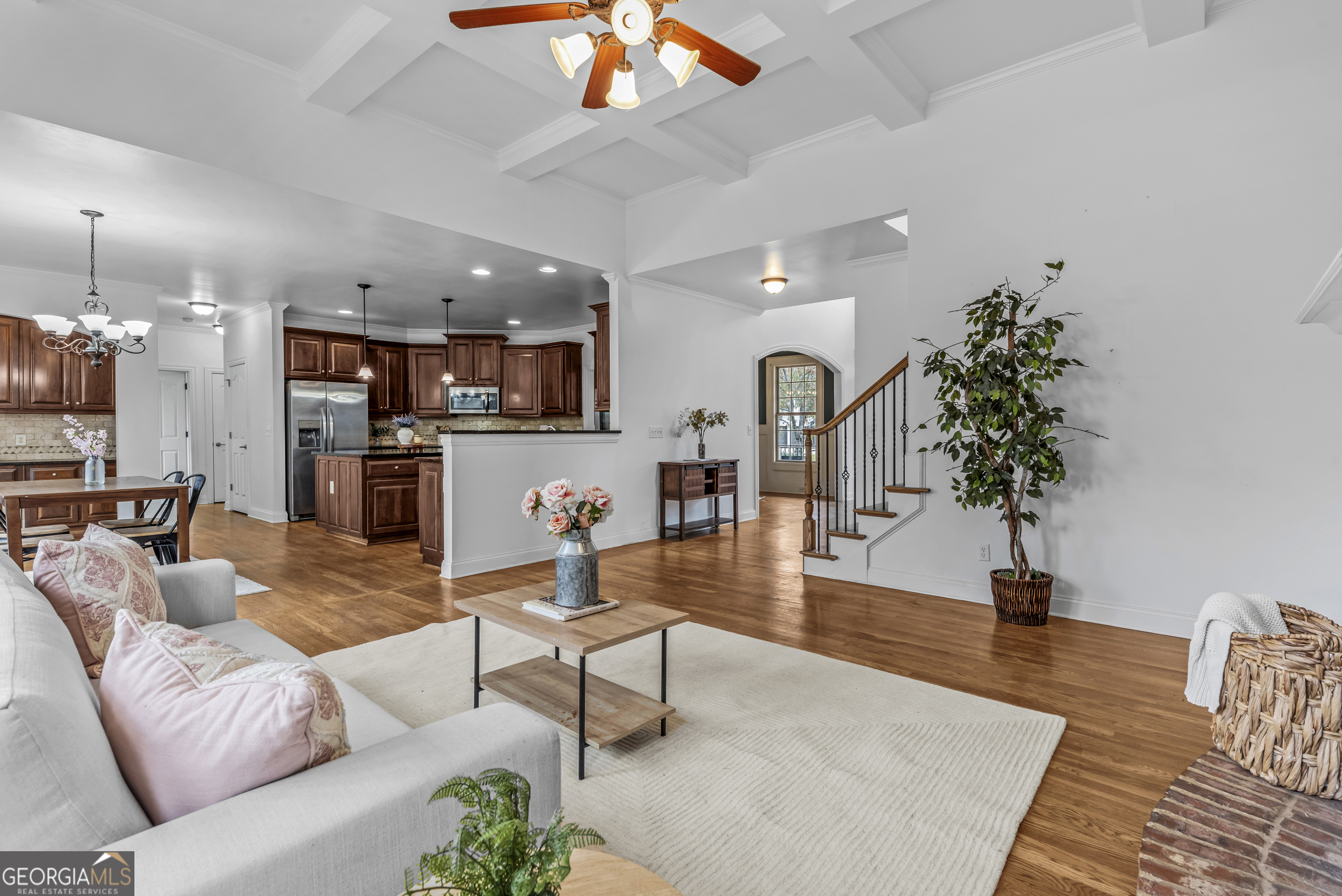 463 Delaperriere Loop Jefferson, GA 30549 - Photo 50 of 75 a living room with furniture and kitchen view