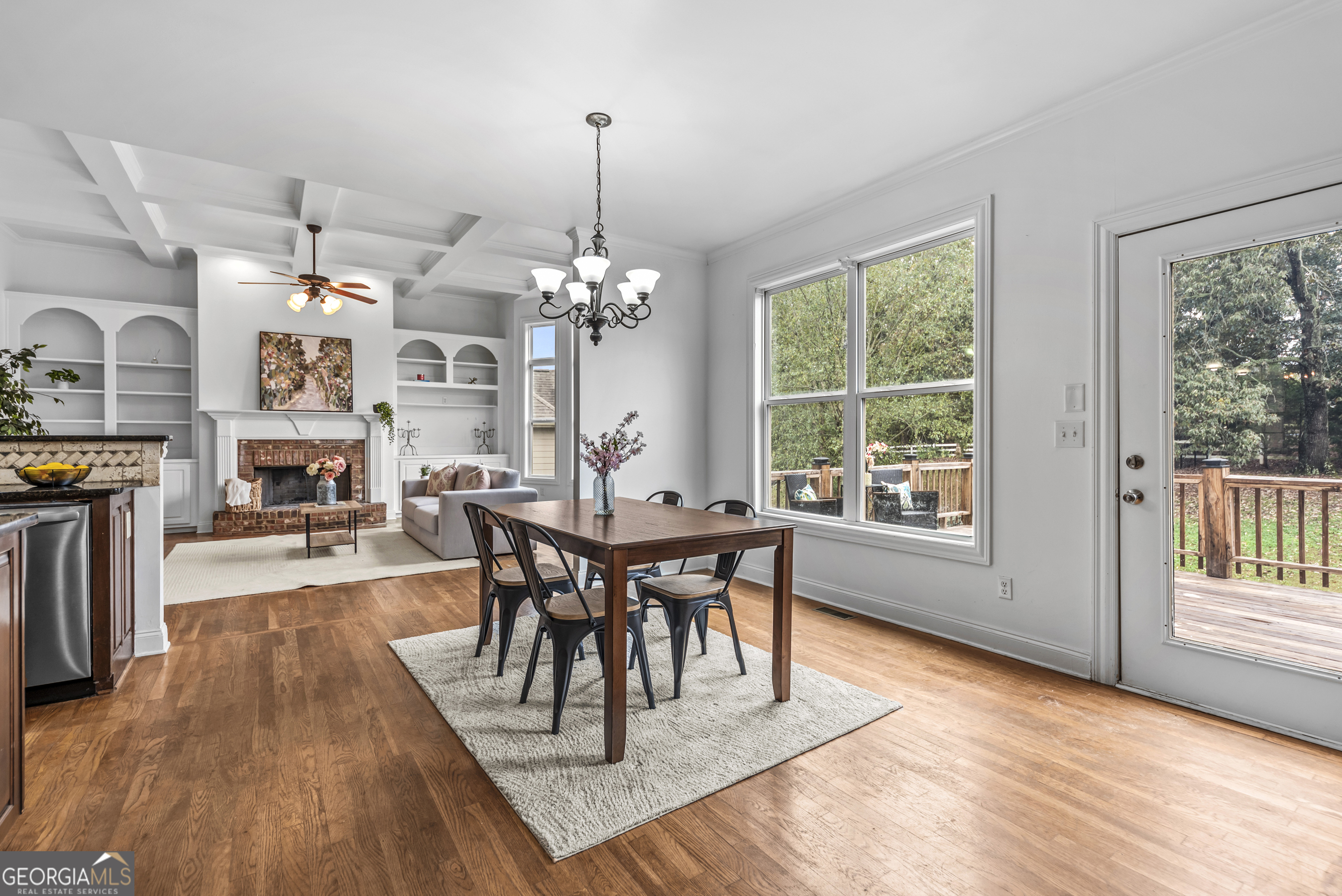 463 Delaperriere Loop Jefferson, GA 30549 - Photo 56 of 75 a view of a dining room with furniture window and wooden floor
