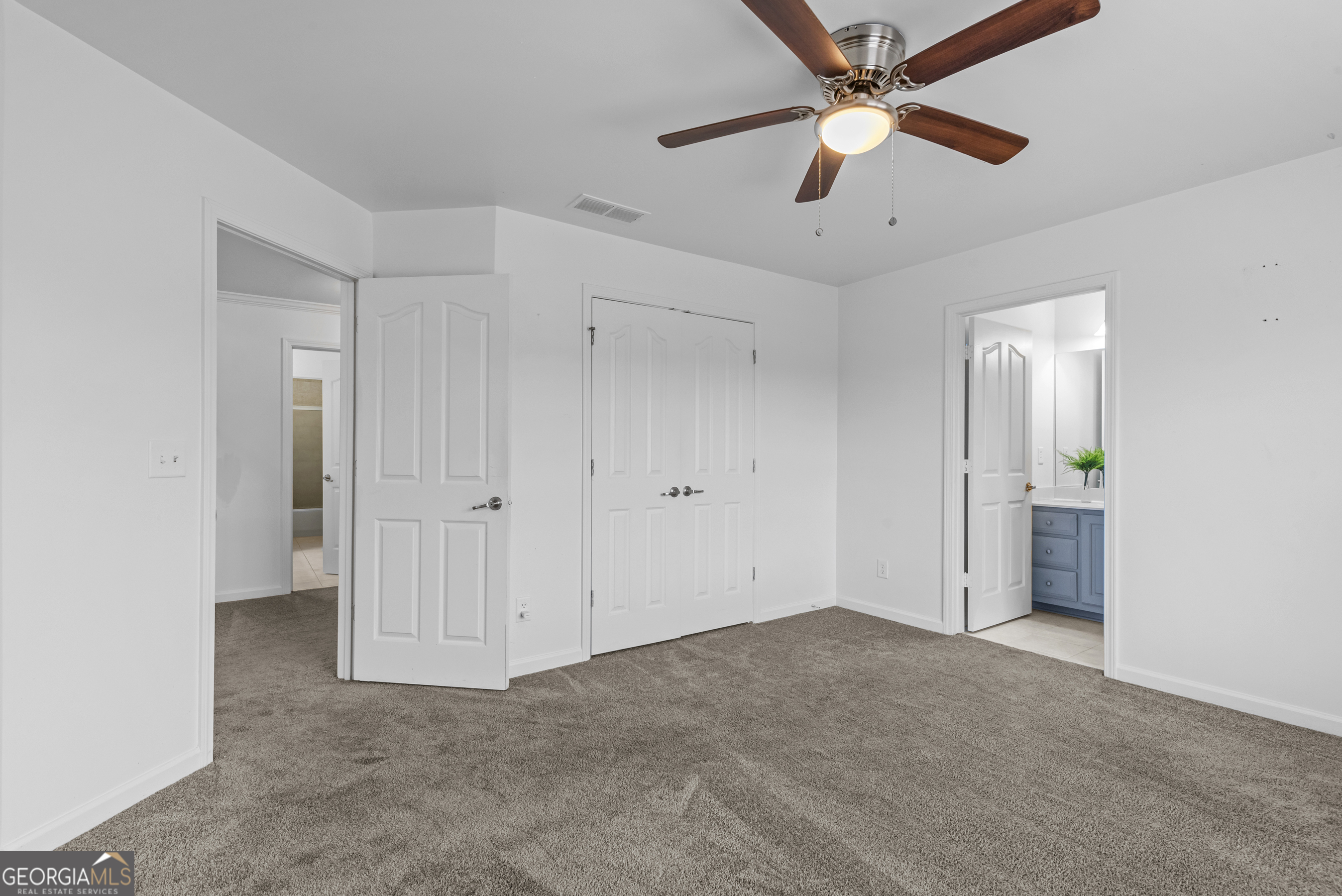 463 Delaperriere Loop Jefferson, GA 30549 - Photo 62 of 75 a view of a room with a ceiling fan and entryway