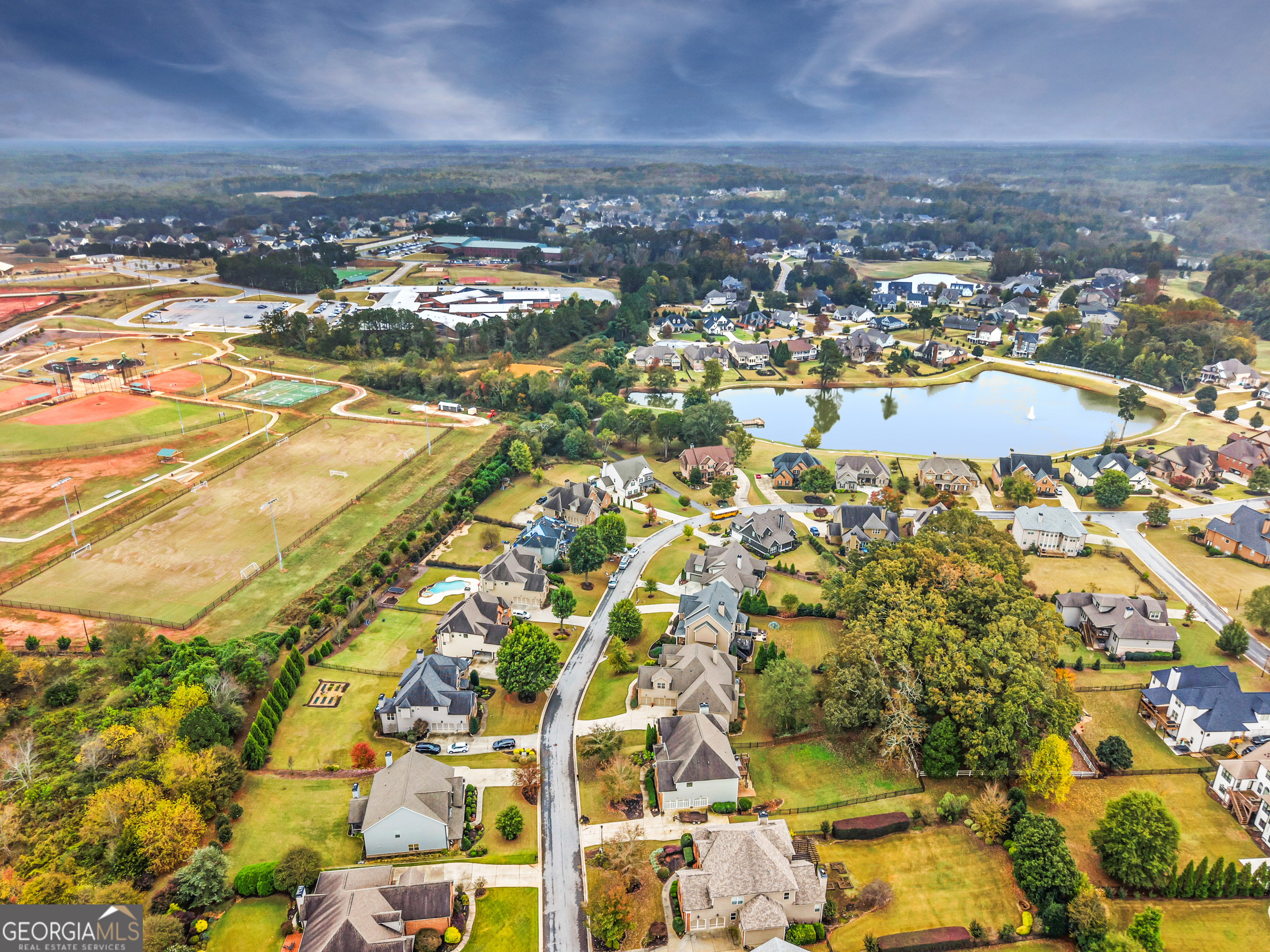 463 Delaperriere Loop Jefferson, GA 30549 - Photo 68 of 75 an aerial view of residential building and parking space