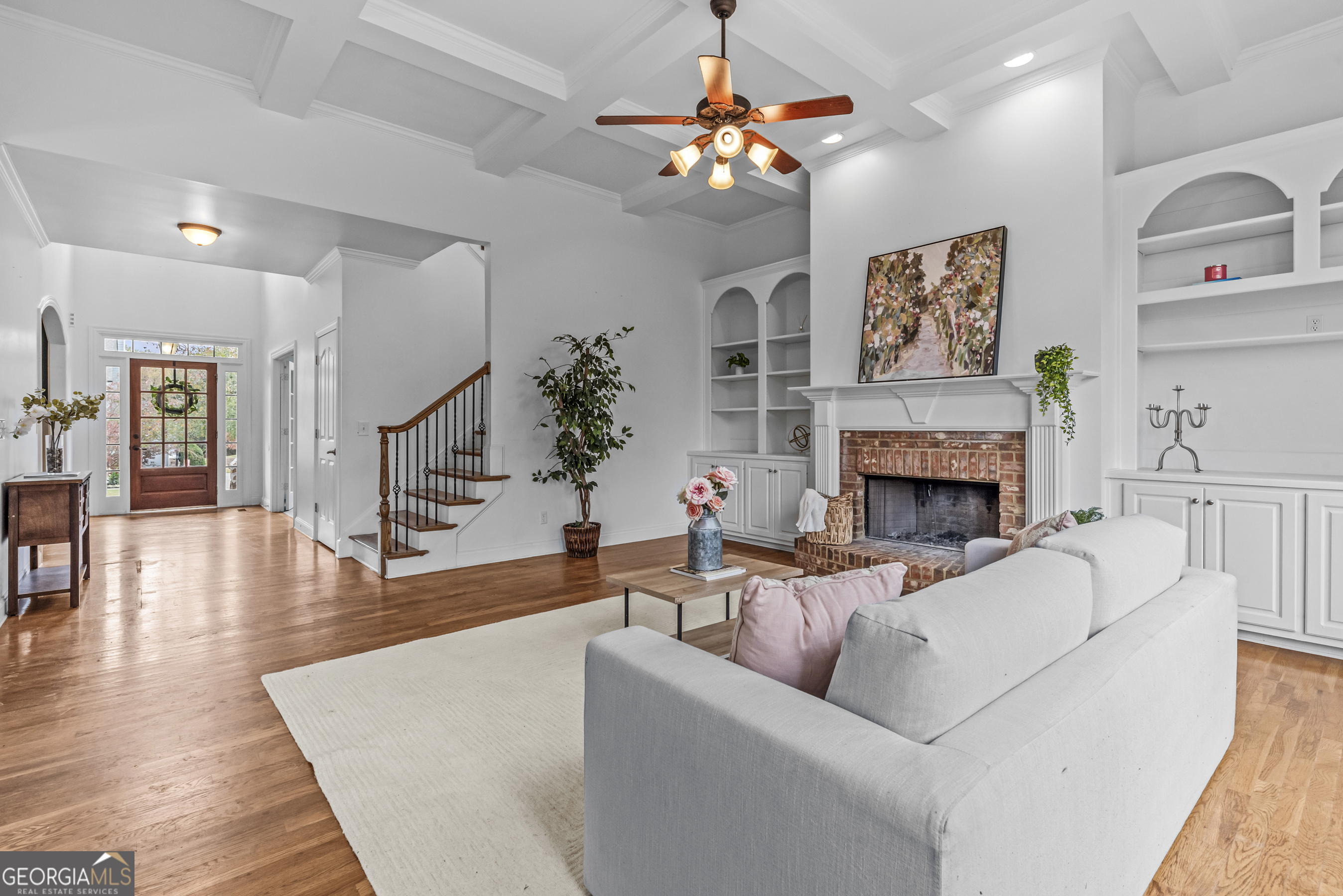 463 Delaperriere Loop Jefferson, GA 30549 - Photo 10 of 75 a living room with furniture and a fireplace