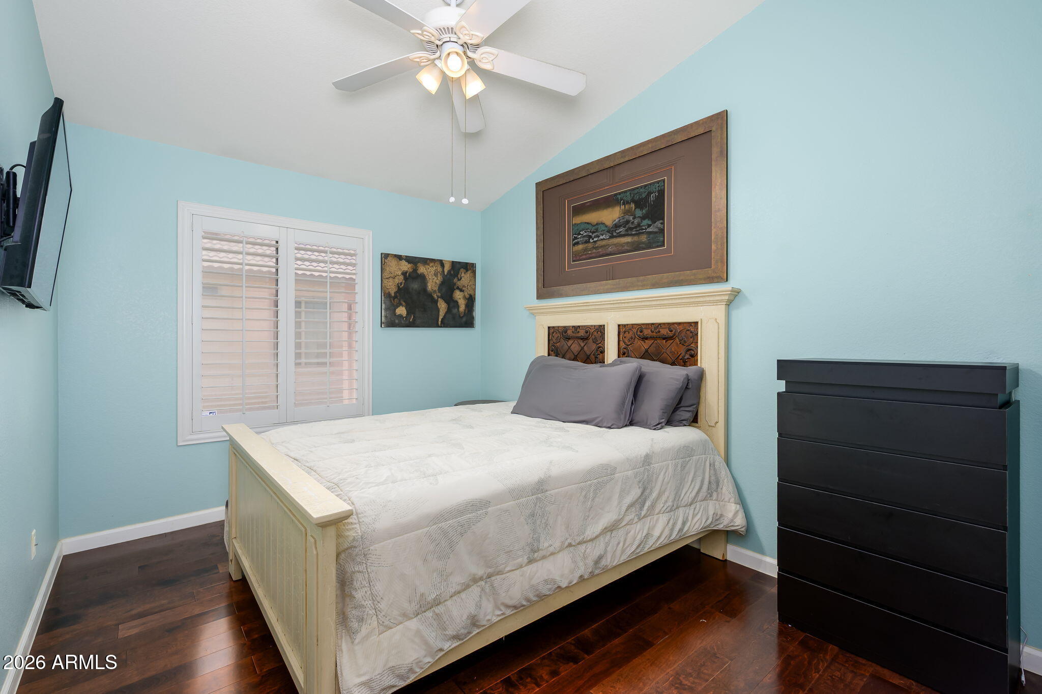 3136 East Roveen Avenue Phoenix, AZ 85032 - Photo 23 of 38 a bedroom with a bed and a dresser
