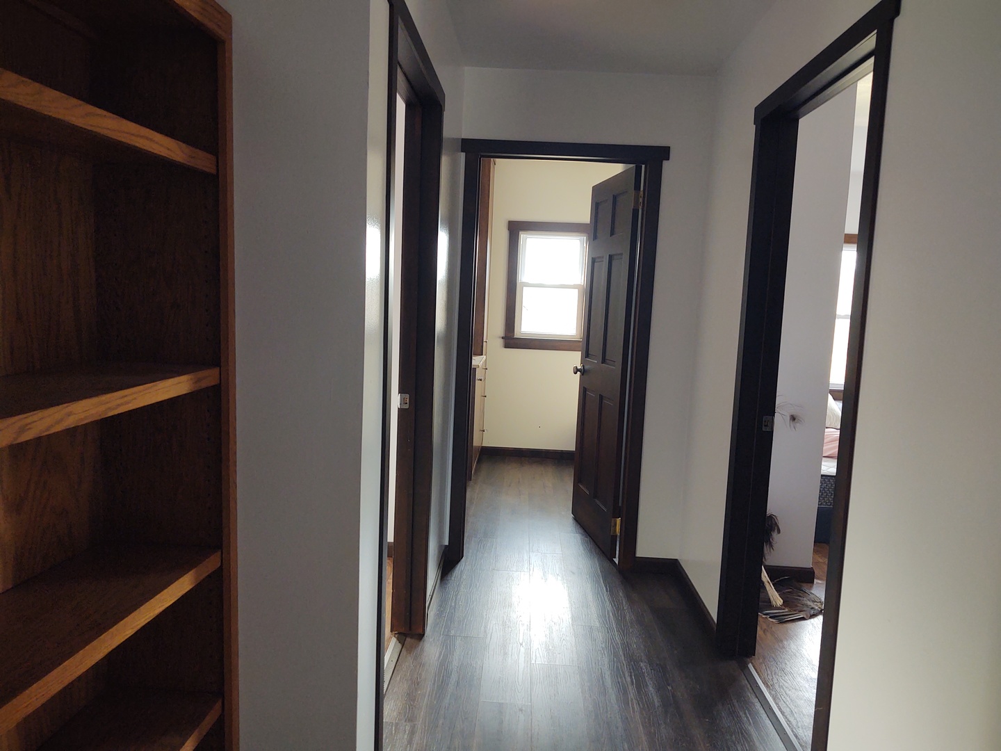 2950 Mt Zion Road Vienna, IL 62995 - Photo 13 of 36 a view of a hallway with wooden floor