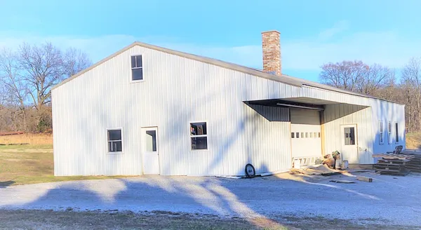 a front view of a house with wooden floor