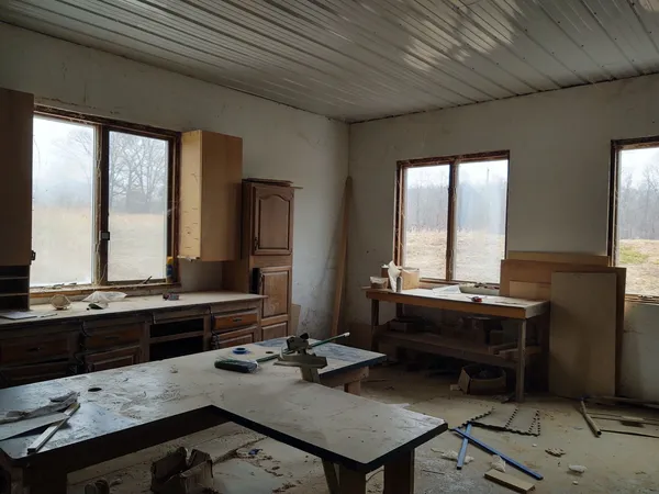 a kitchen with a sink and a stove top oven