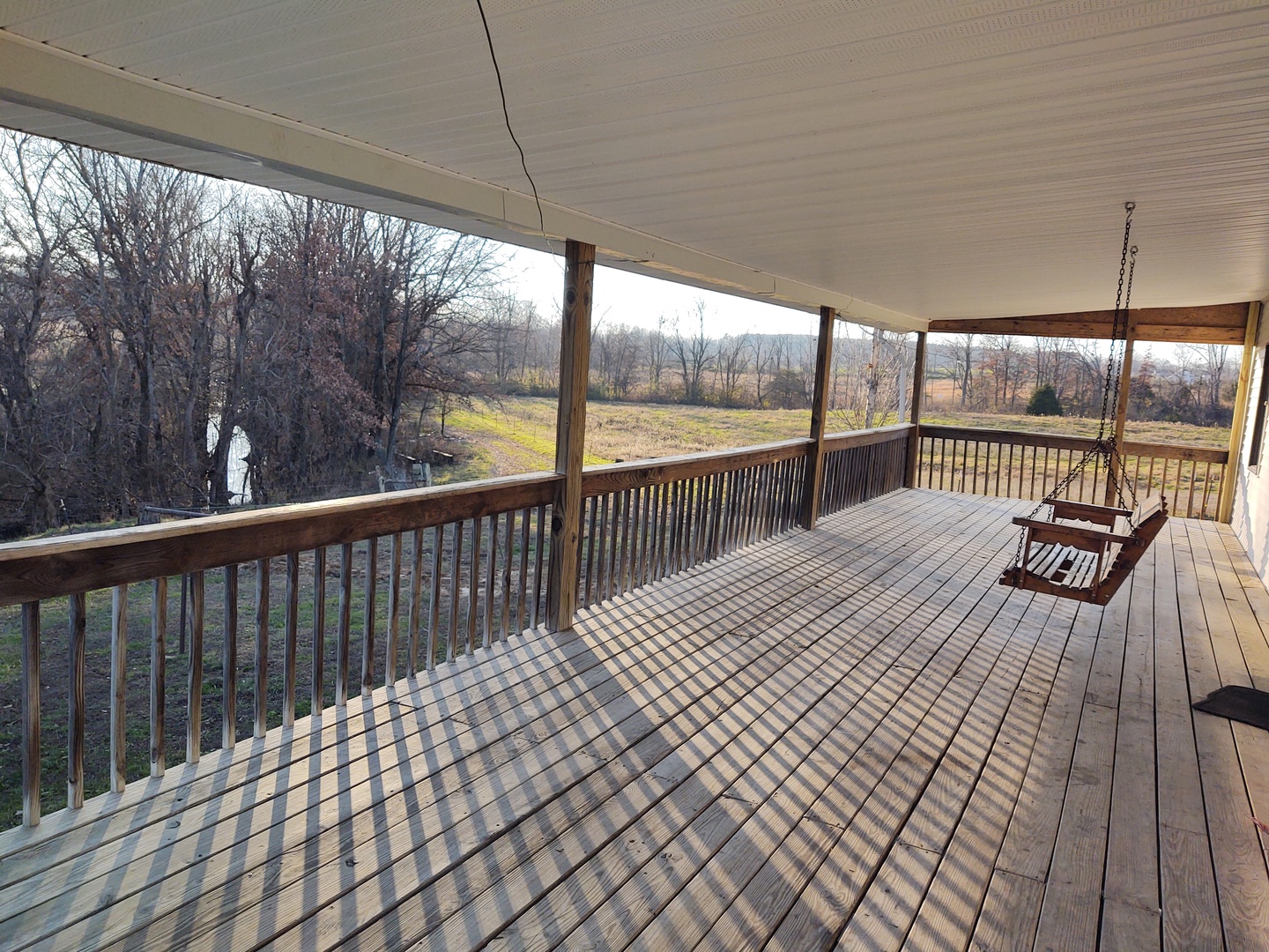 2950 Mt Zion Road Vienna, IL 62995 - Photo 6 of 36 a view of balcony with wooden floor