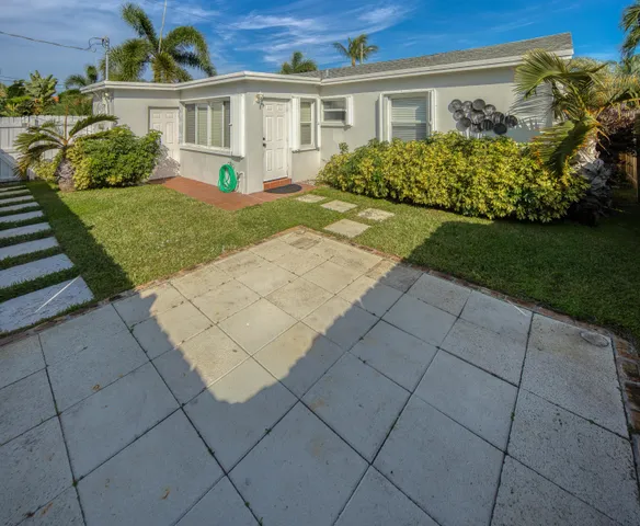 a view of a house with a garden