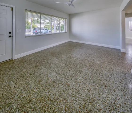 an empty room with windows