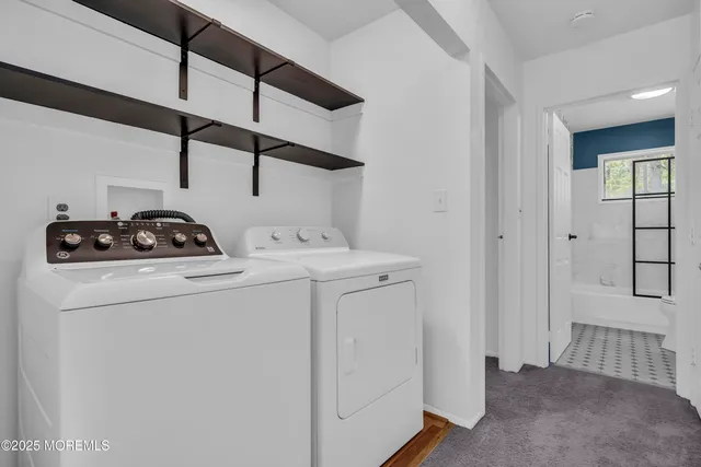 a bathroom with a shower and a bathtub