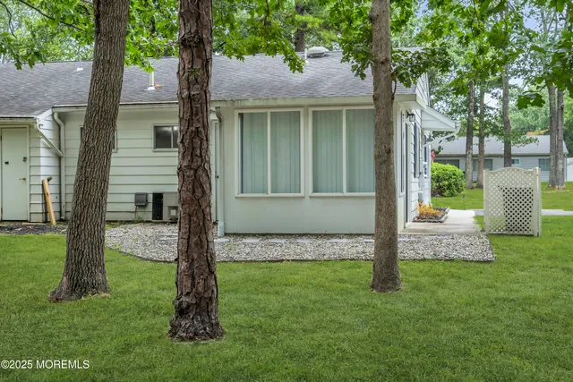 a view of a backyard with a garden