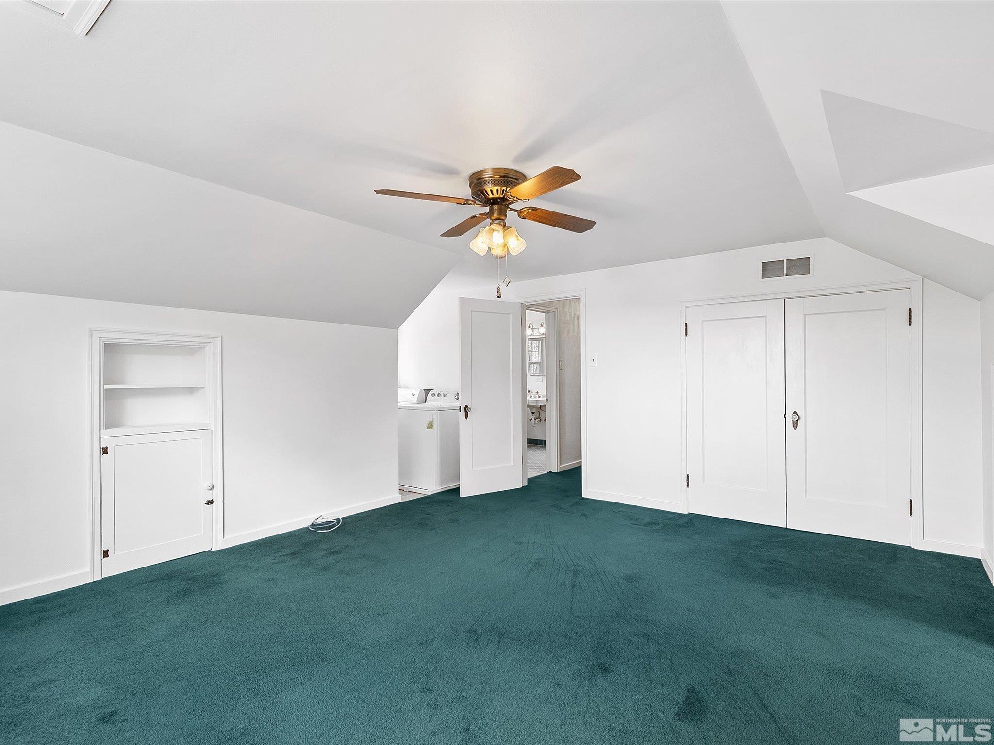 811 Washington Street Reno, NV 89503 - Photo 14 of 35 a view of an empty room with a ceiling fan