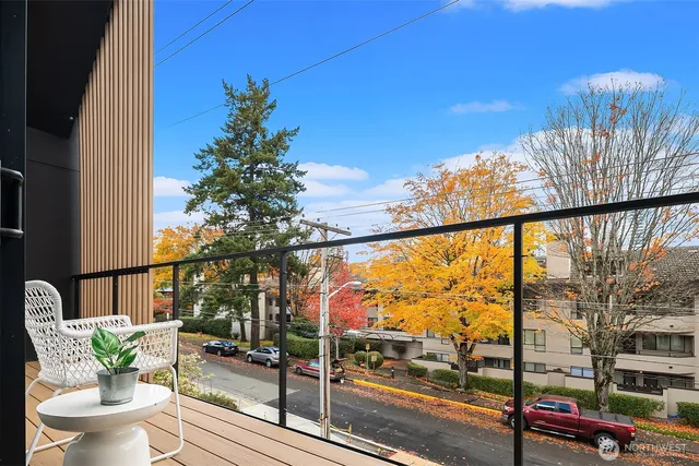 a view of balcony with furniture
