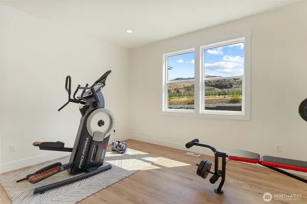 a view of a room with gym equipment