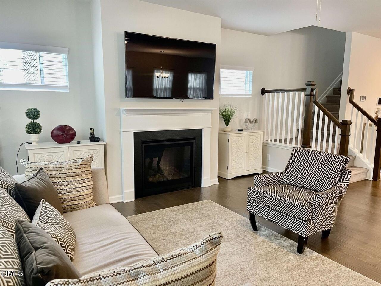 1807 Wrenn Road Durham, NC 27703 - Photo 4 of 43 a living room with furniture and a fireplace