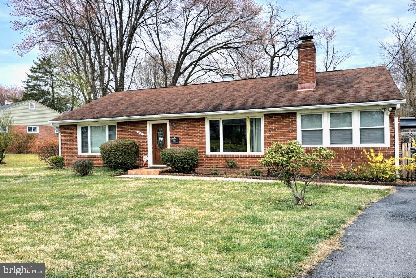 a house view with a garden space