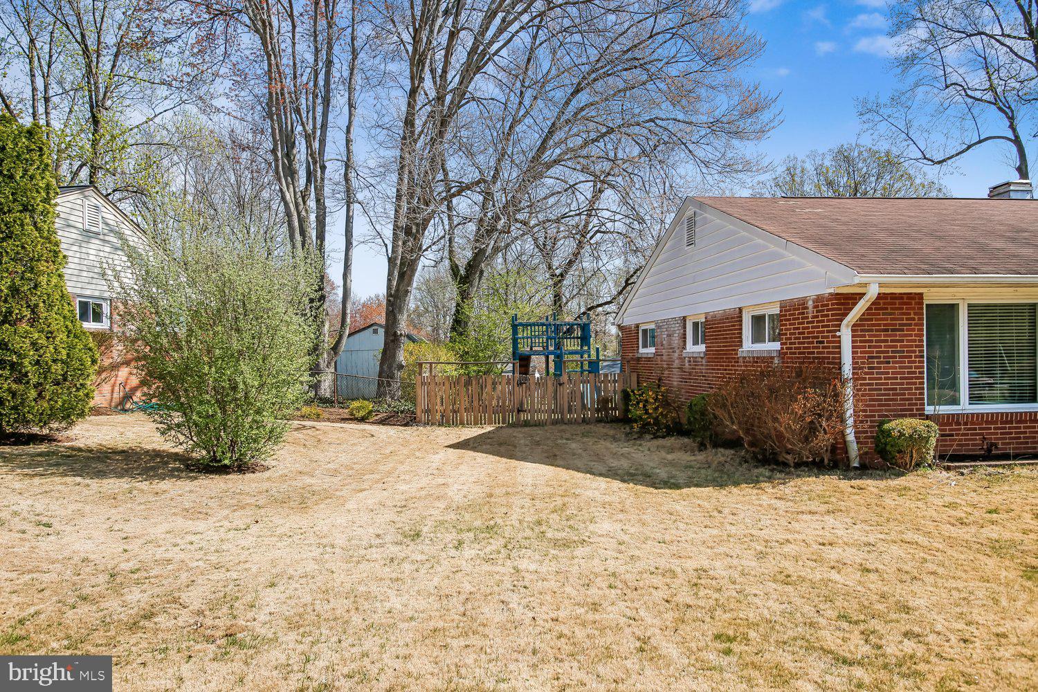 3610 Parklane Road Fairfax, VA 22030 - Photo 18 of 55 a front view of a house with a yard and garage