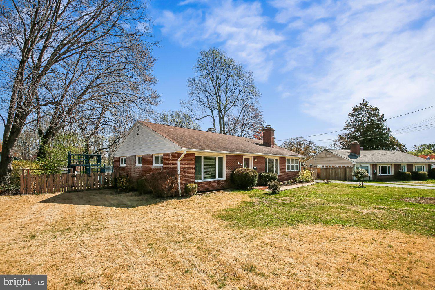 3610 Parklane Road Fairfax, VA 22030 - Photo 19 of 55 a view of a house with a yard covered with snow in front of house