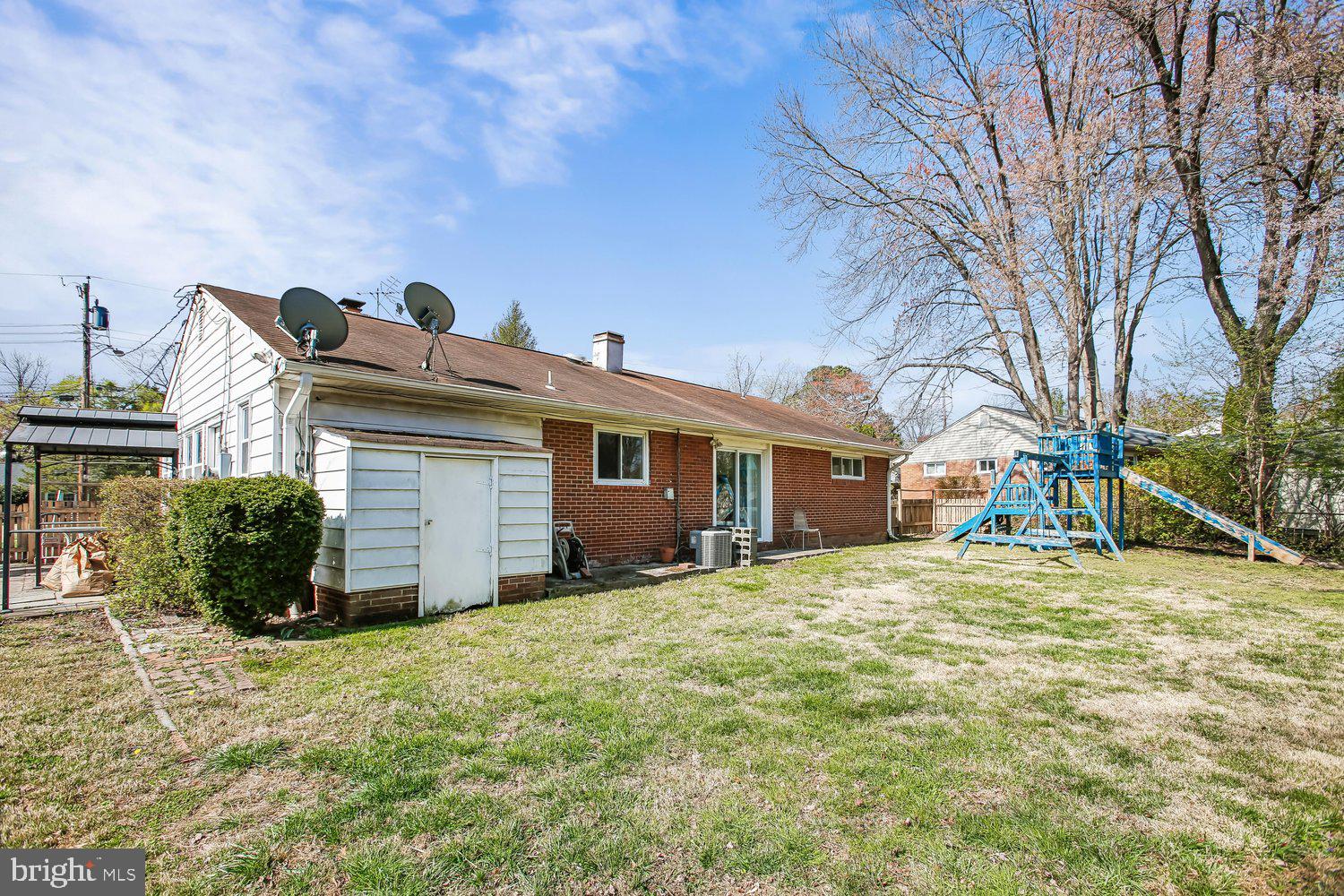 3610 Parklane Road Fairfax, VA 22030 - Photo 20 of 55 a view of a house with a yard and garage