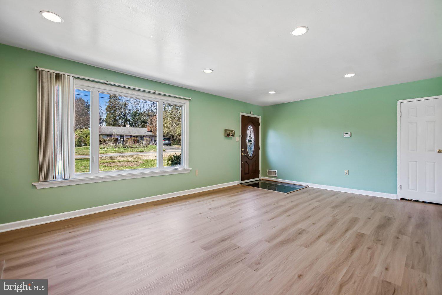 3610 Parklane Road Fairfax, VA 22030 - Photo 24 of 55 an empty room with wooden floor and a window