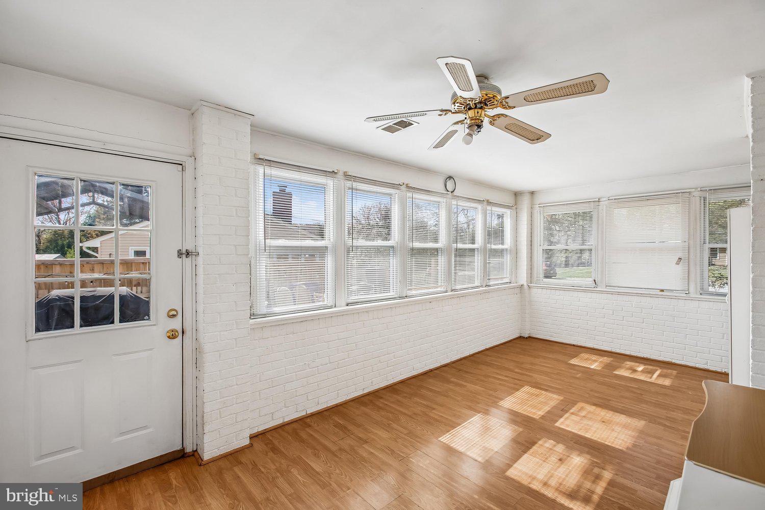 3610 Parklane Road Fairfax, VA 22030 - Photo 28 of 55 a view of a livingroom with a ceiling fan and window