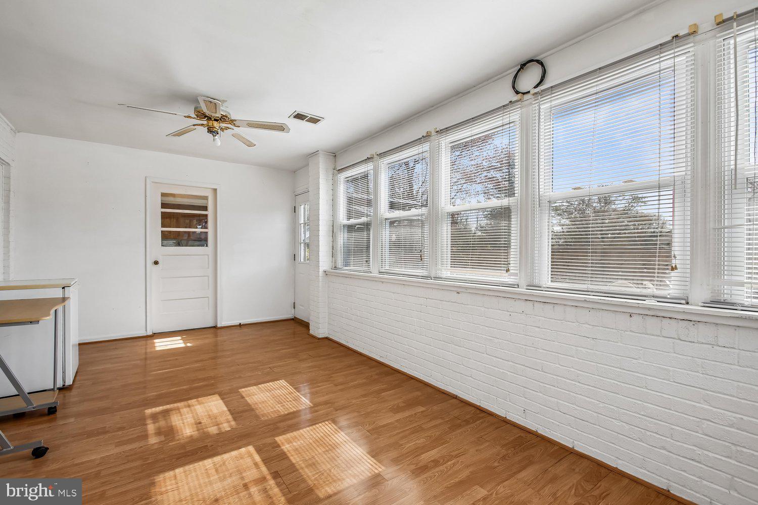 3610 Parklane Road Fairfax, VA 22030 - Photo 29 of 55 a view of an empty room with a window and wooden floor