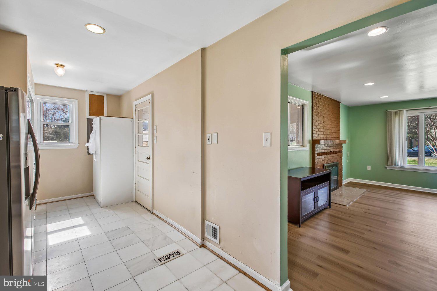 3610 Parklane Road Fairfax, VA 22030 - Photo 38 of 55 a view of a refrigerator in kitchen and an empty room