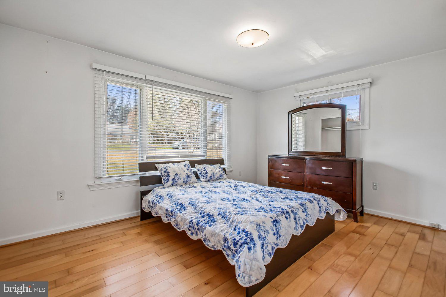 3610 Parklane Road Fairfax, VA 22030 - Photo 41 of 55 a bedroom with a bed and wooden floor