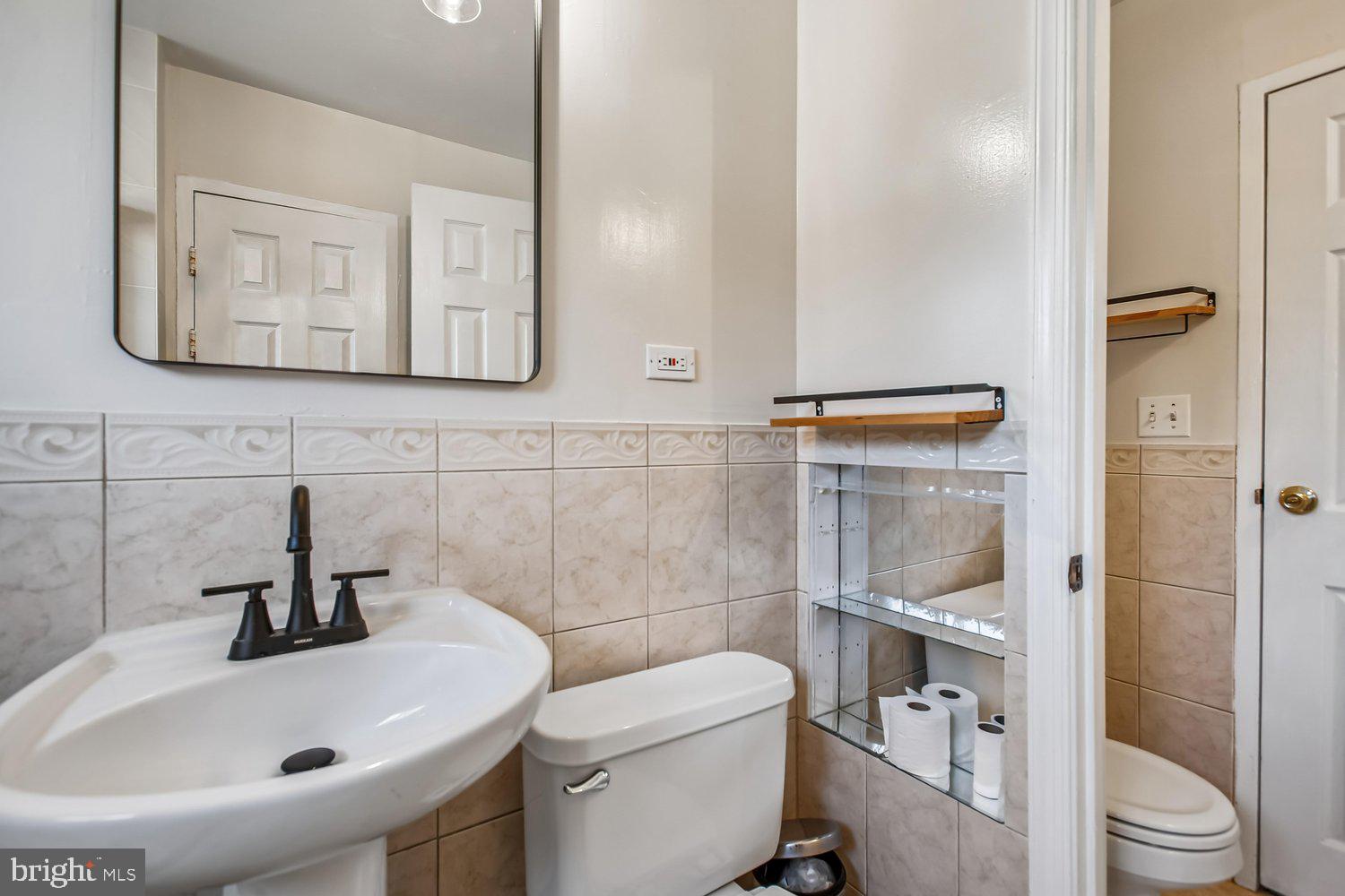 3610 Parklane Road Fairfax, VA 22030 - Photo 46 of 55 a bathroom with a sink toilet and shower