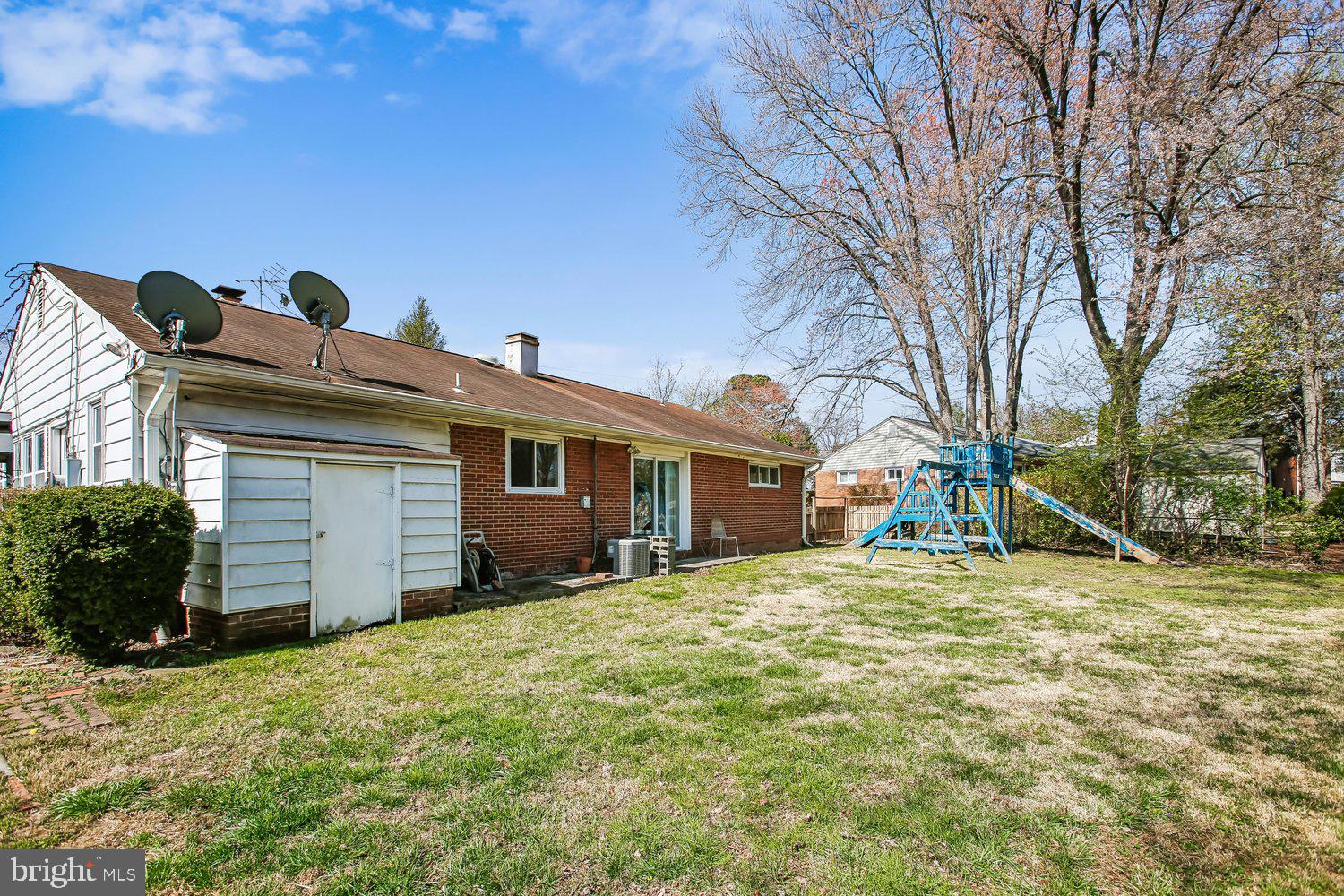 3610 Parklane Road Fairfax, VA 22030 - Photo 9 of 55 a view of a house with a yard and garage