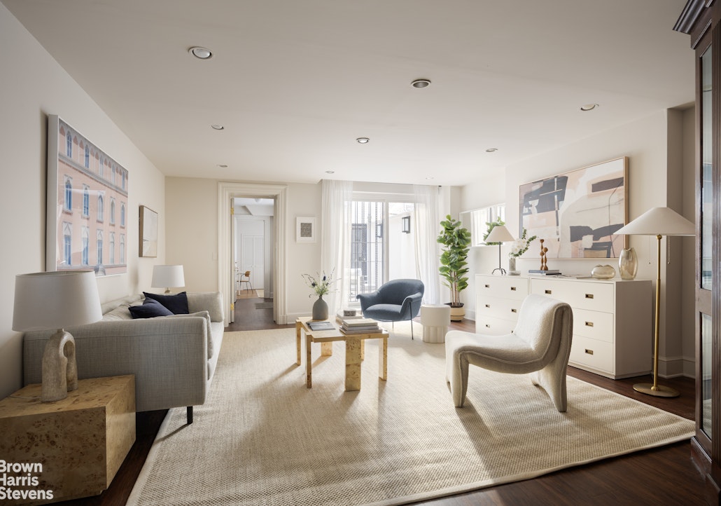 57 East 74th Street Manhattan, NY 10021 - Photo 12 of 60 a living room with furniture and wooden floor